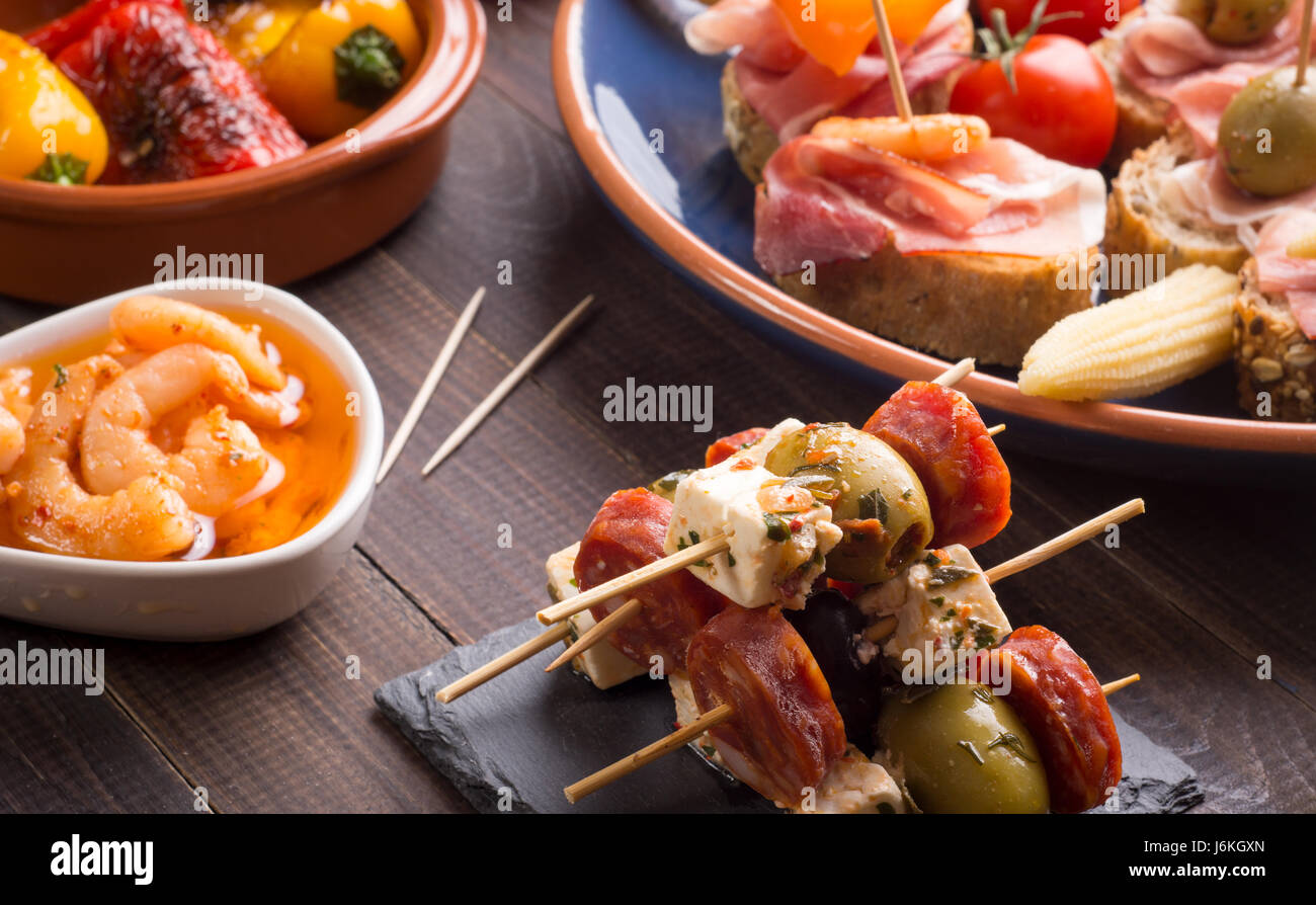 Mixed Spanish Tapas Starters On Old Wooden Table Stock Photo Alamy mixed-spanish-tapas-starters-on-old-wooden-table-stock-photo-alamy