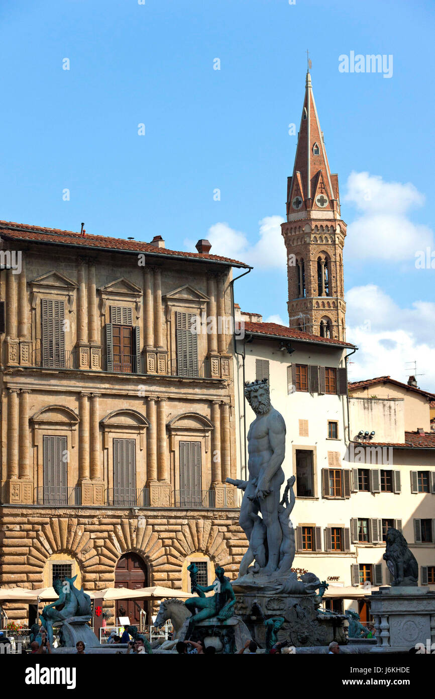 Statue of Neptune and Basilica of Badia Florentina ( Church ) Piazza della Signoria,  Florence, Italy Stock Photo