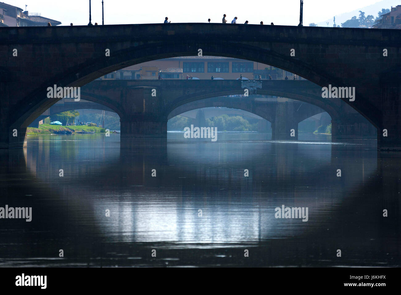 Alla Carraio Bridge over the River Arno with Ponte Vecchio in the background, Florence, Italy Stock Photo