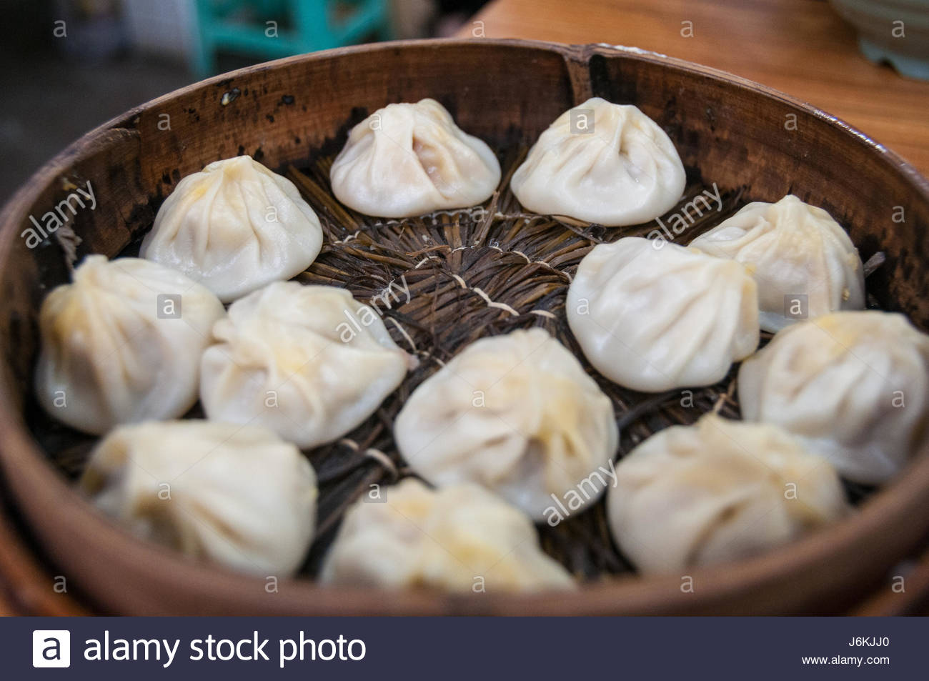 A basket of steamed xiaolongbao soup dumplings at Jia Jia Tang Bao ...