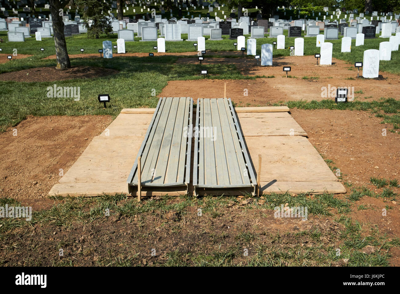 freshly dug grave prepared for burial arlington cemetery Washington DC USA Stock Photo