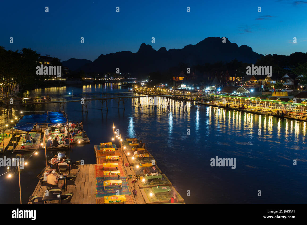 Vang Vieng, Laos - January 19, 2017: Restaurant on the riverfront at night in Vang Vieng, Laos Stock Photo