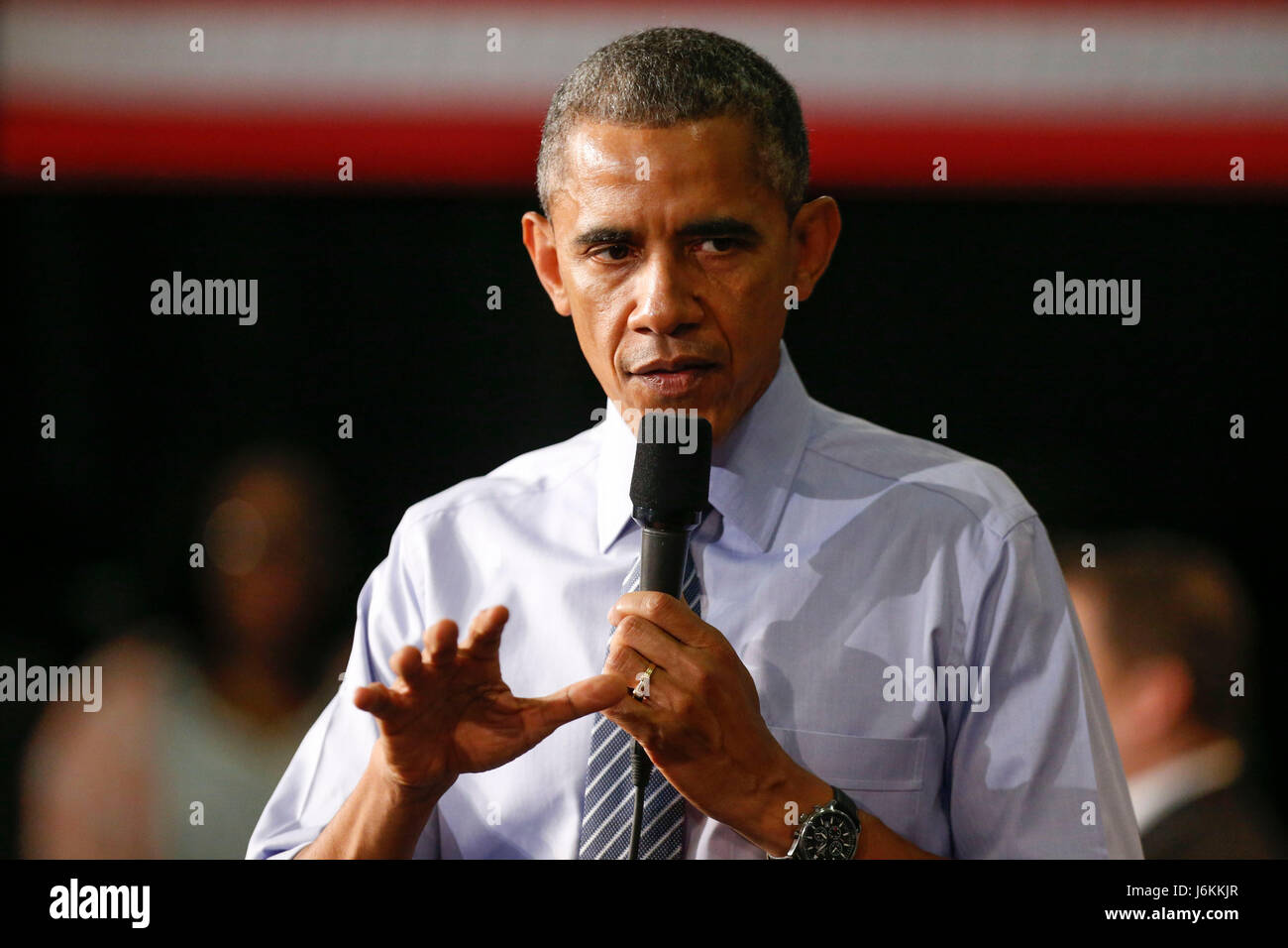 President Barack Obama answers questions during a town hall meeting at Ivy Tech in Indianapolis. Obama talked about his proposal to offer two years of free community college to eligible students, at Ivy Tech Community College. The program would require students to maintain at least a 2.5 GPA. Stock Photo