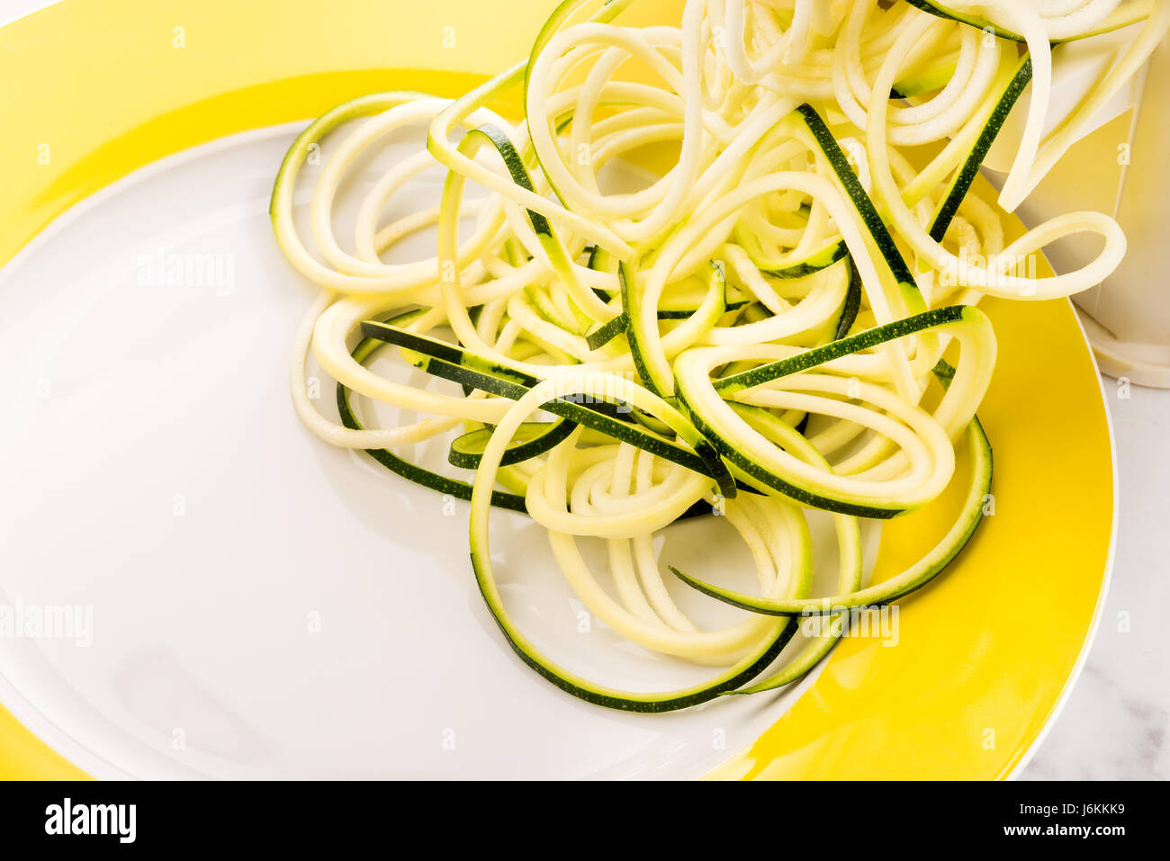 Zoodles making vegetable spaghetti zucchini pasta low carb Stock Photo
