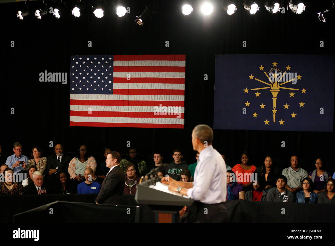 President Barack Obama answers questions during a town hall meeting at Ivy Tech in Indianapolis. Obama talked about his proposal to offer two years of free community college to eligible students, at Ivy Tech Community College. The program would require students to maintain at least a 2.5 GPA. Stock Photo