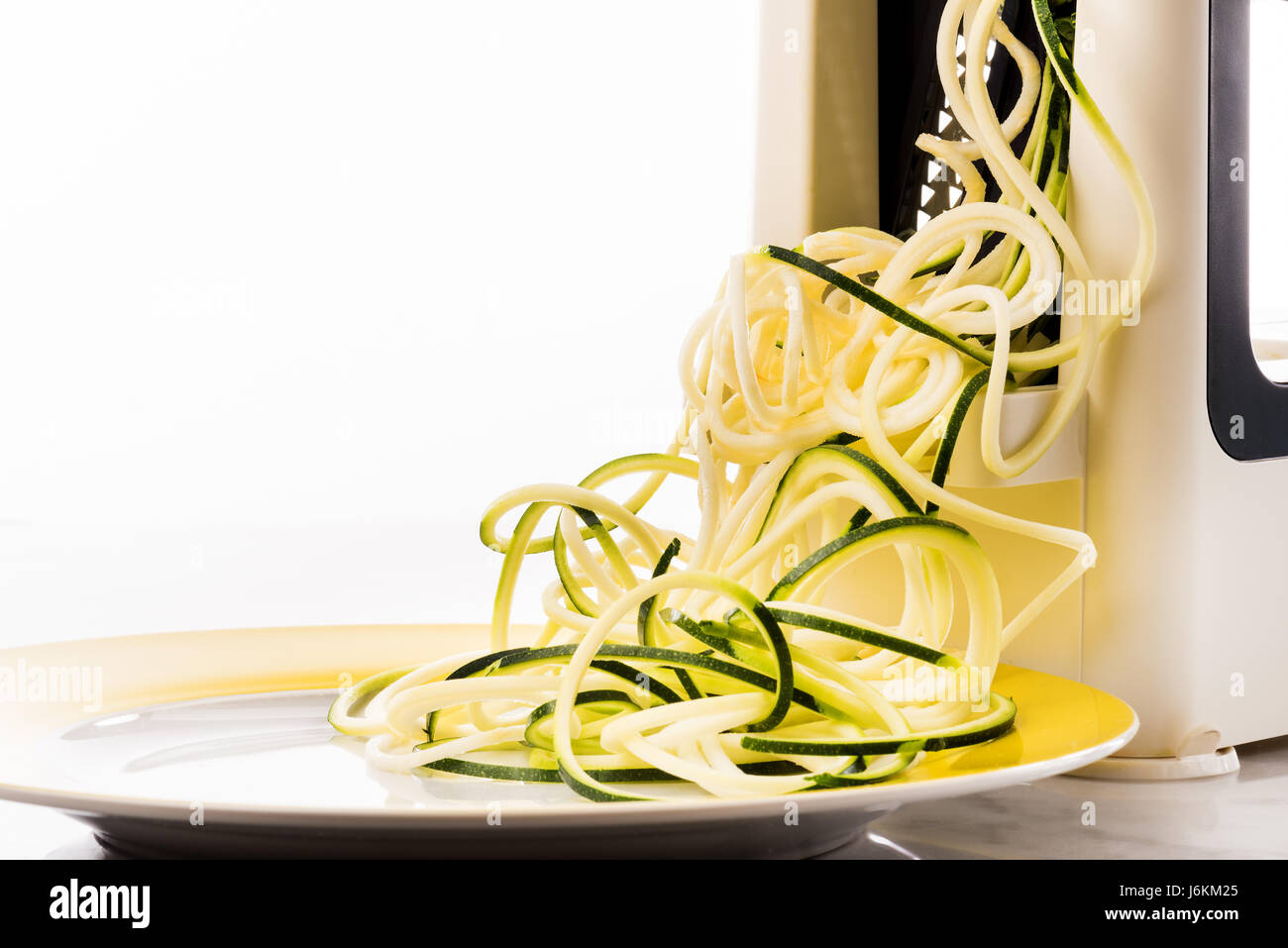 Zoodles making vegetable spaghetti zucchini pasta low carb Stock Photo