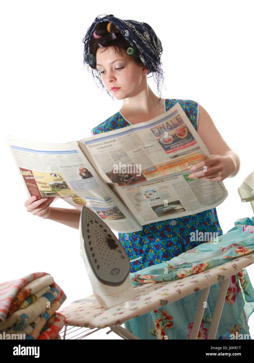 housewife with newspaper and chocolates Stock Photo - Alamy
