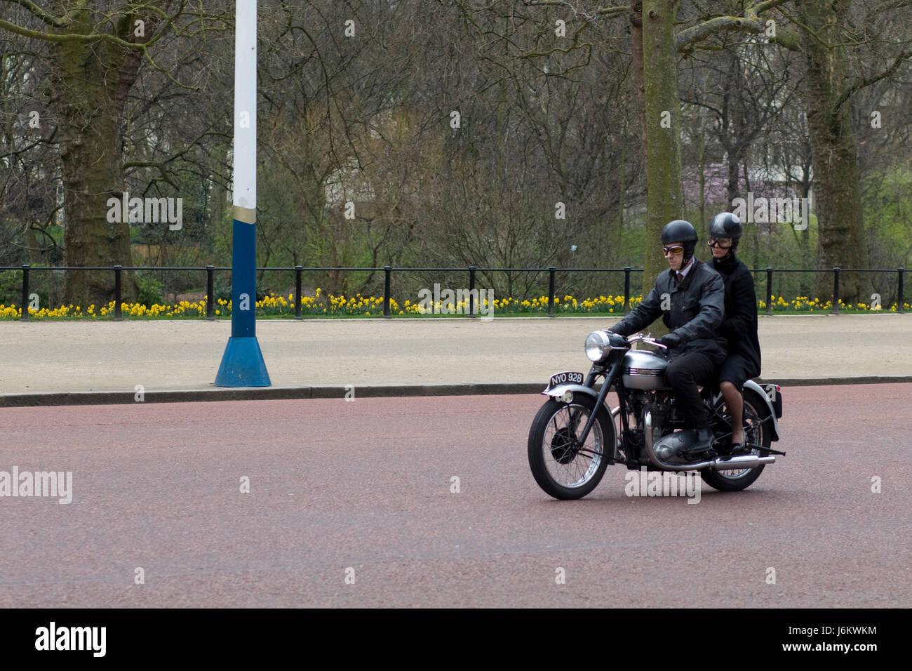 Actors filming the crown on a Triumph Tiger 100 Stock Photo