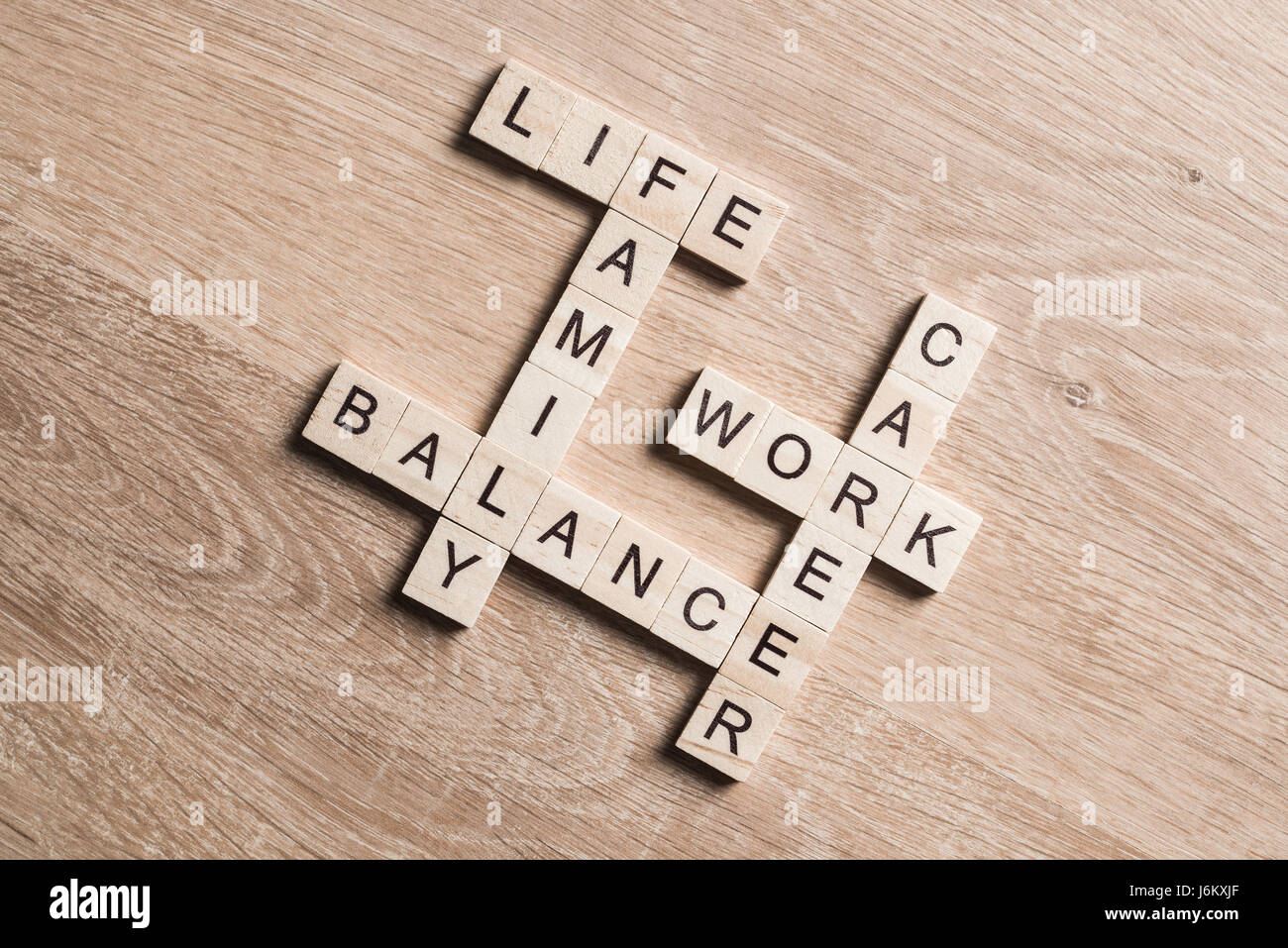 Words work life balance and family on table collected with wooden cubes ...
