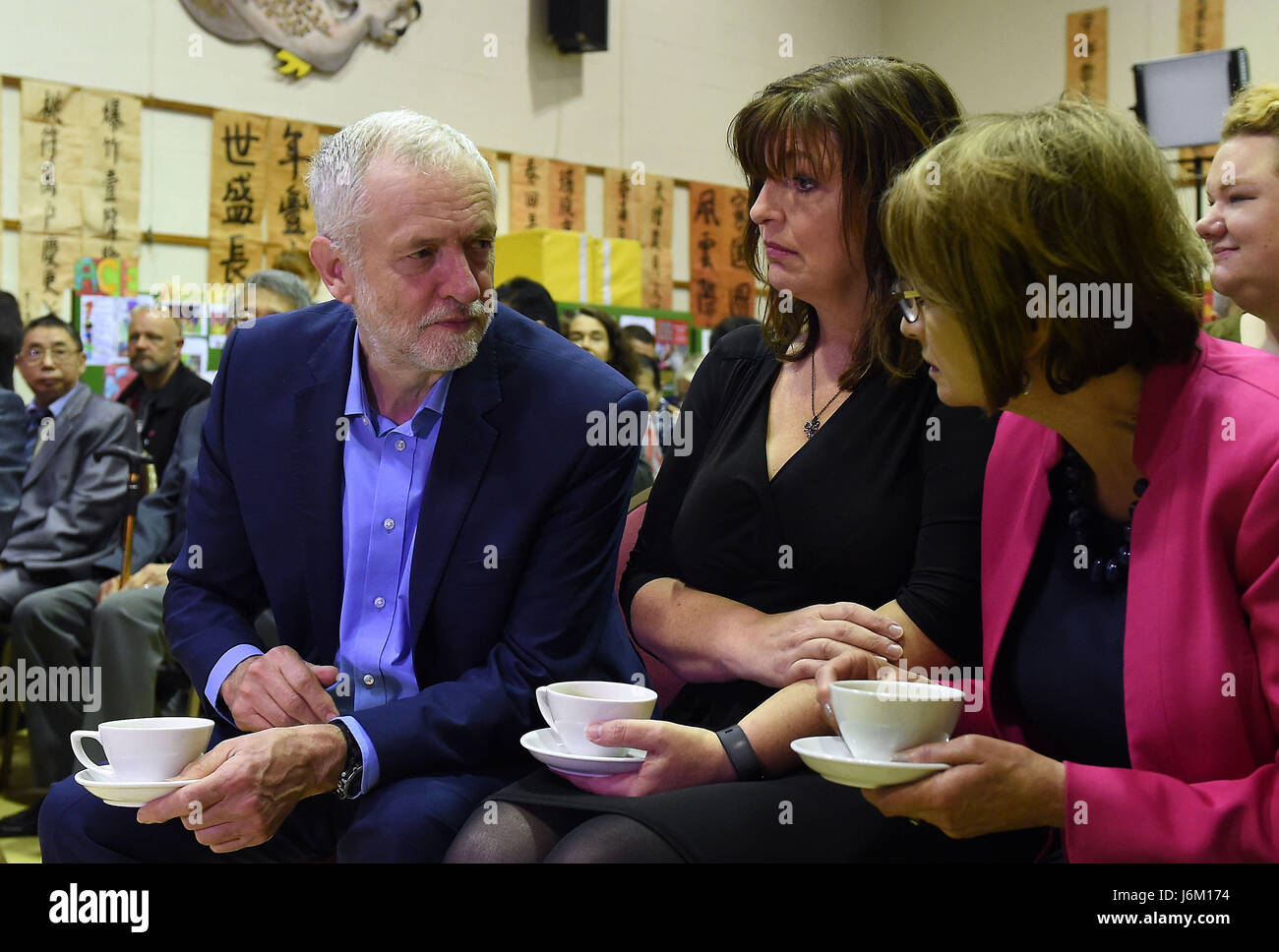 Labour leader Jeremy Corbyn with Deputy Mayor of Liverpool Ann O'Byrne (centre) during a community visit to Pagoda Arts in Liverpool, as general election campaigning is paused for the day to honour murdered MP Jo Cox by focusing on what politicians have in common. Stock Photo