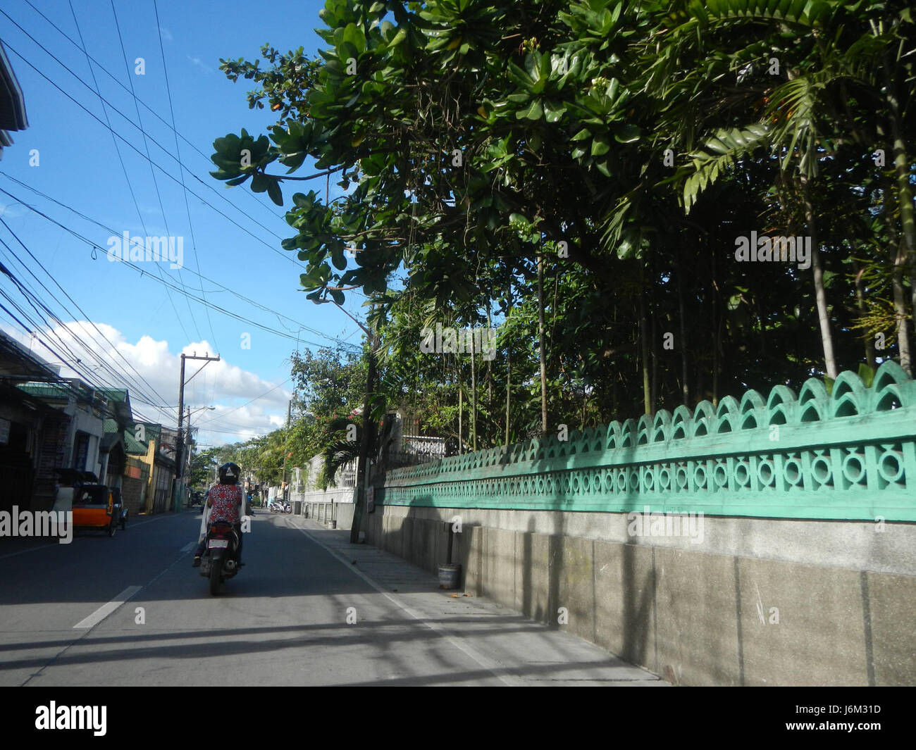 This image captures the rural landscape of Ibayo Poblacion, Nagbalon ...