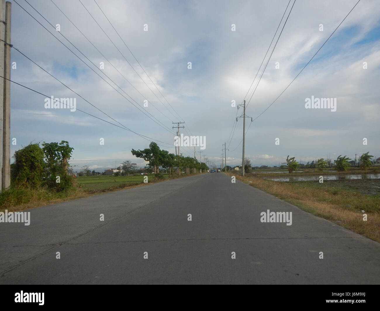 Sumacab This image showcases the expansive paddy fields and grasslands located ...