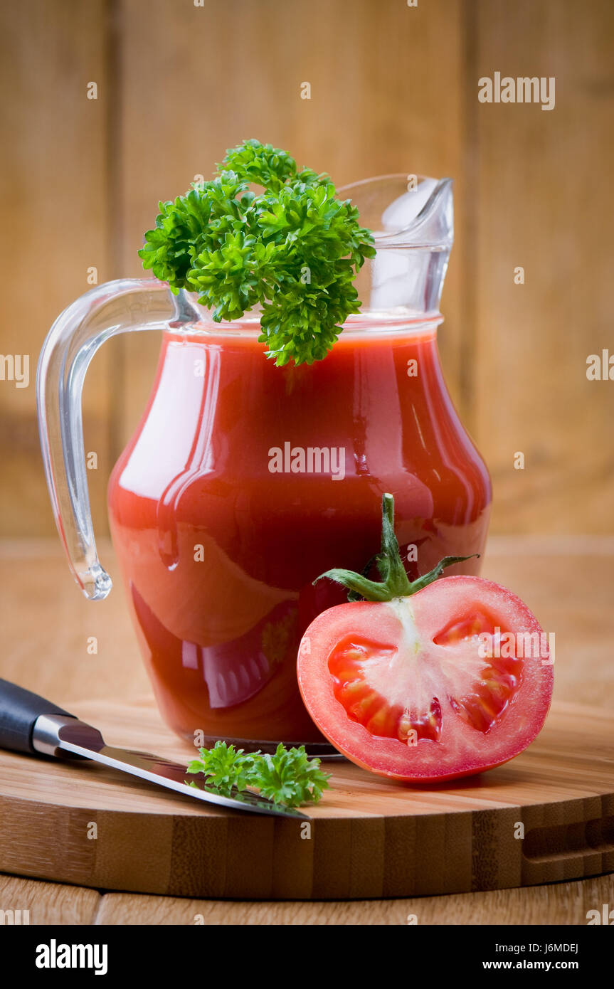 jug juice tomato glass chalice tumbler board drink drinking bibs liquid