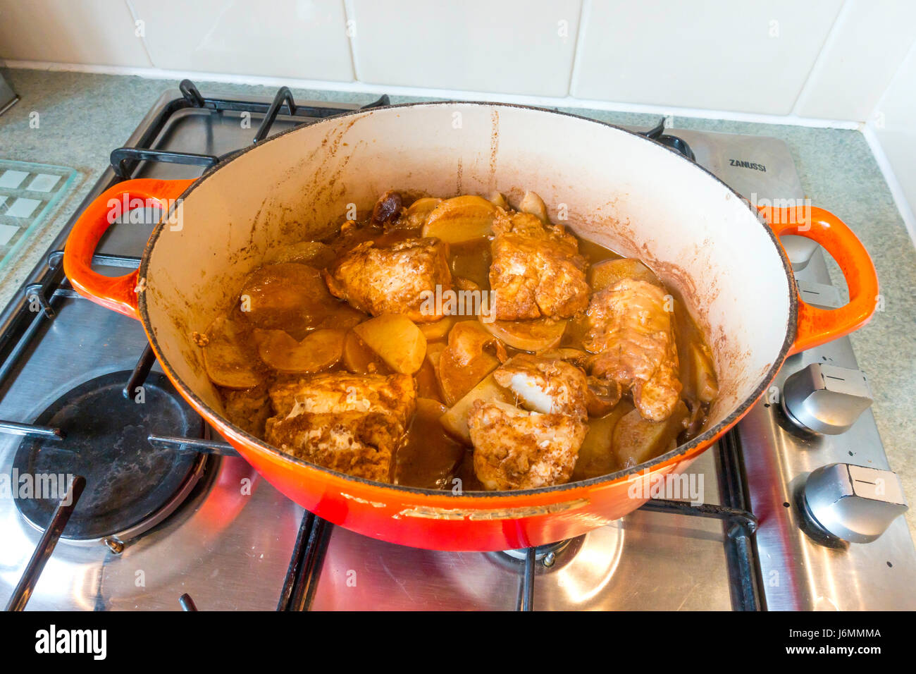 Moroccan Fish Casserole or Tagine Samak made white turnips and dates cooked in Chermoula a spicy
