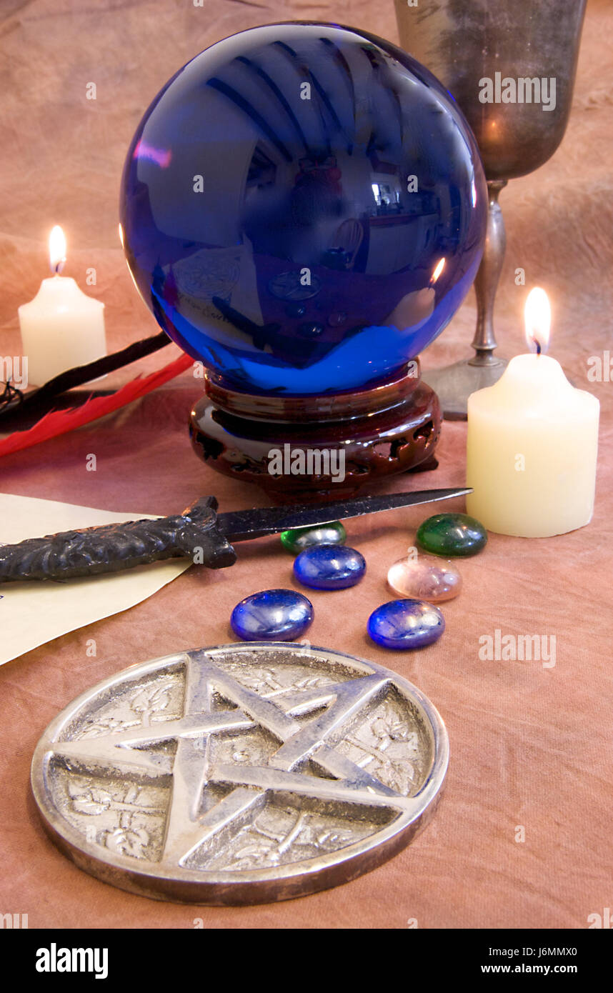 crystal rustical rustic witchcraft pentacle pentagram spell arm weapon knive Stock Photo