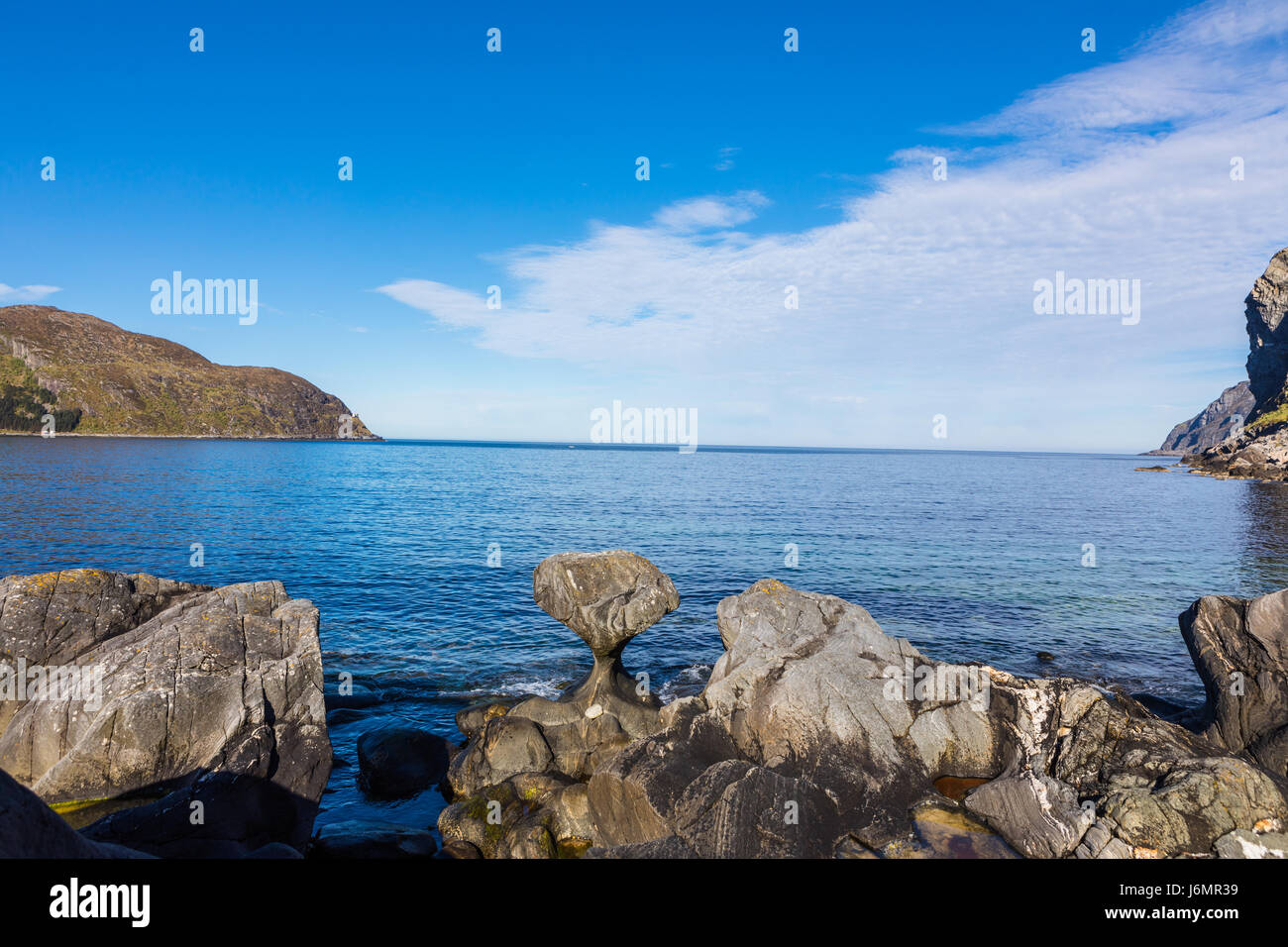 Kannesteinen is a special shaped stone located on the shore of Oppedal. Stock Photo
