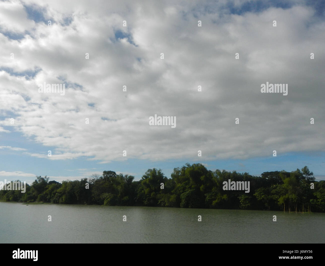 This image shows the riprap construction along the riverbanks of ...