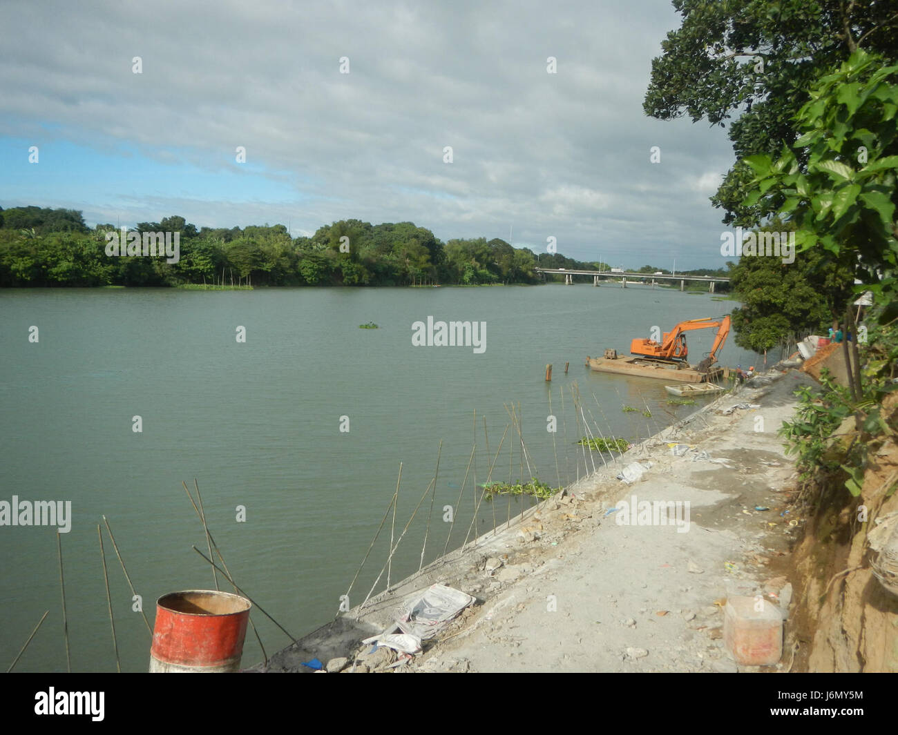 Riprap construction along the Pulilan riverbanks in Plaridel, Bulacan ...