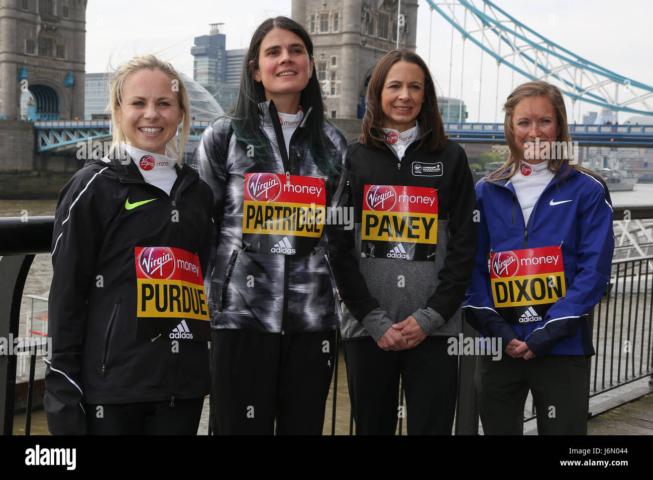 Leading British long-distance-runners in this year's Virgin Money London Marathon pose for photographs opposite Tower Bridge in East London ahead of Sunday's London Marathon Race.  Featuring: Charlotte Purdue, Susan Partridge, Jo Pavey and Alyson Dixon (l to r) Where: London, United Kingdom When: 20 Apr 2017 Credit: Dinendra Haria/WENN.com Stock Photo