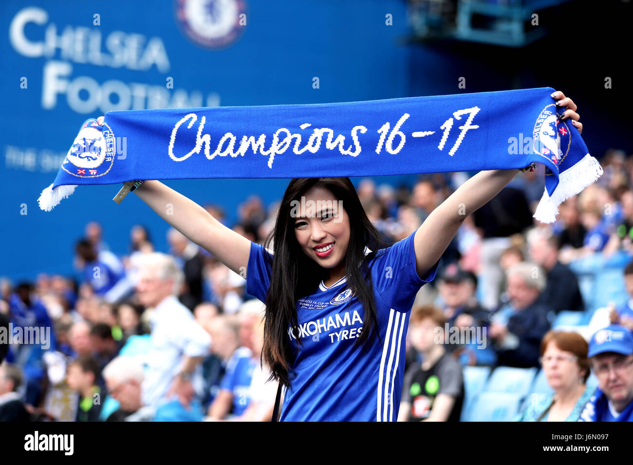 A Chelsea fan ahead of the Premier League match at Stamford Bridge, London. Stock Photo