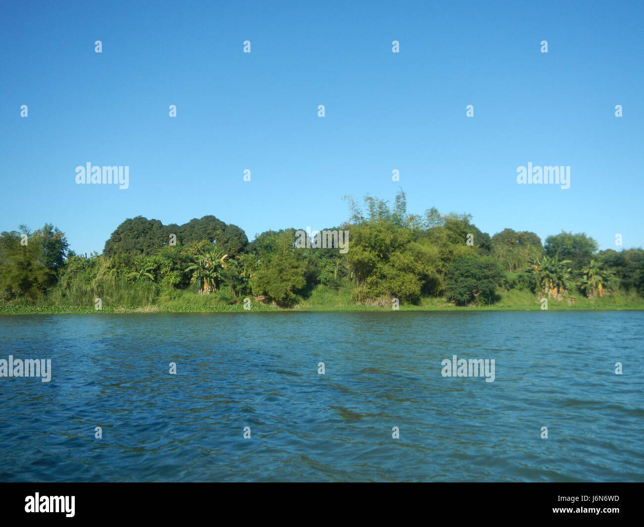 This image depicts the riprap construction along the riverbanks in ...