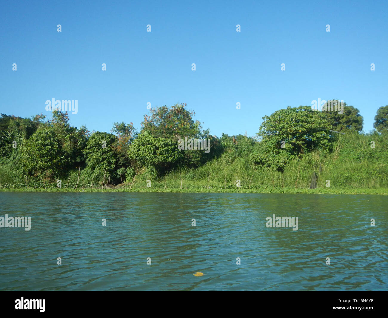 This image shows the riprap construction along the riverbanks in ...