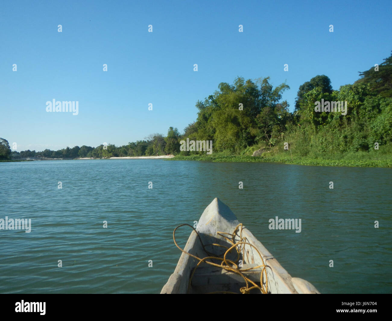 This image captures the ongoing construction of riprap along the ...