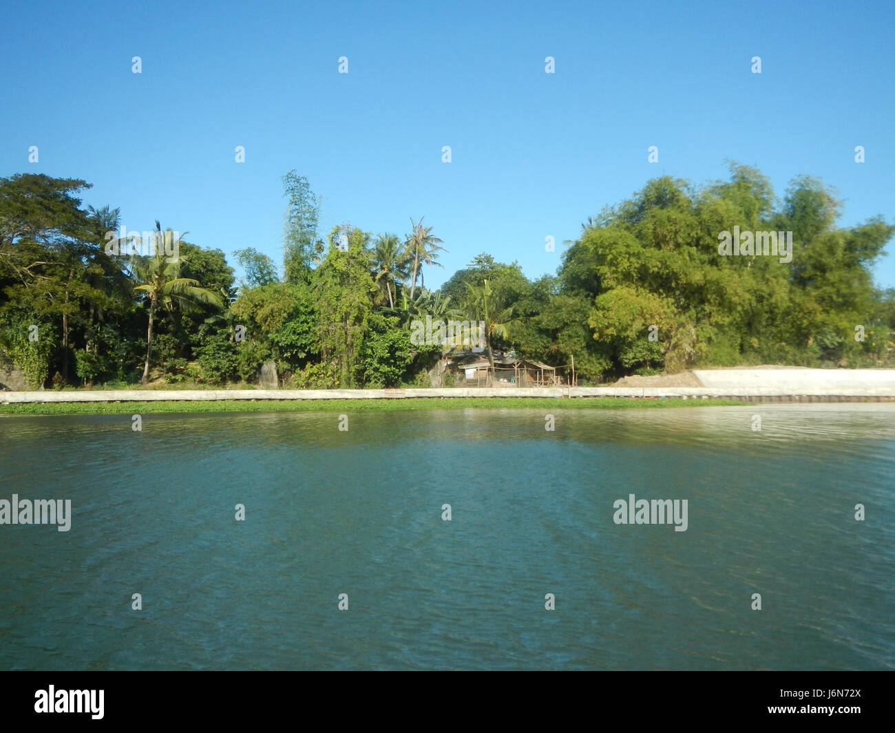 This image depicts the riprap construction along the riverbanks of ...