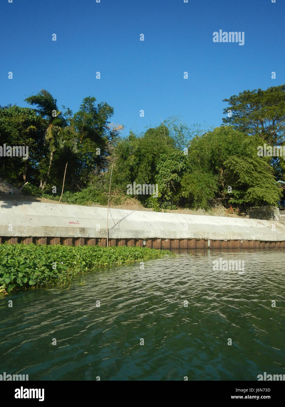 This image shows the riprap construction along the riverbanks in ...