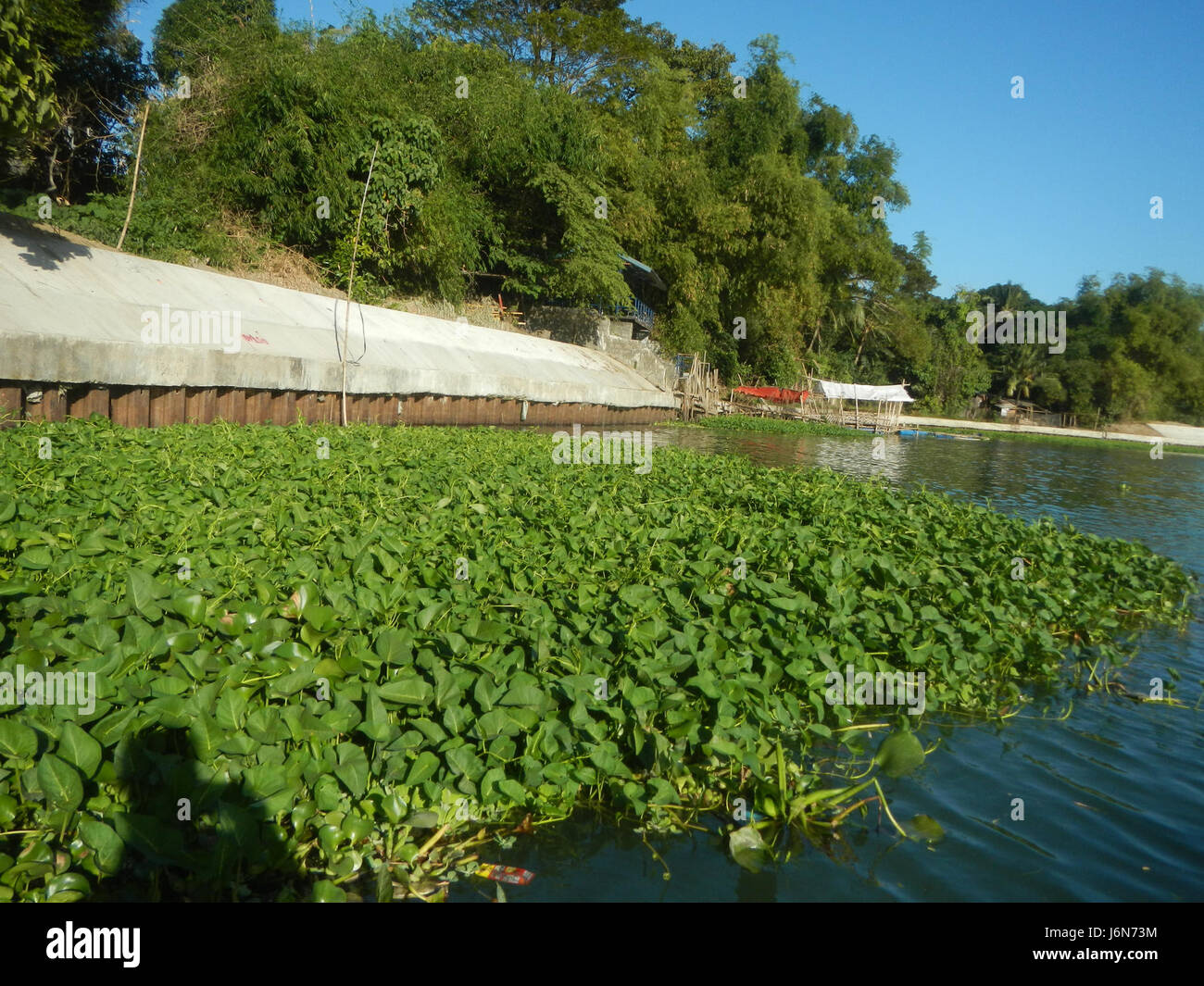 This image documents the riprap construction along the riverbanks of ...