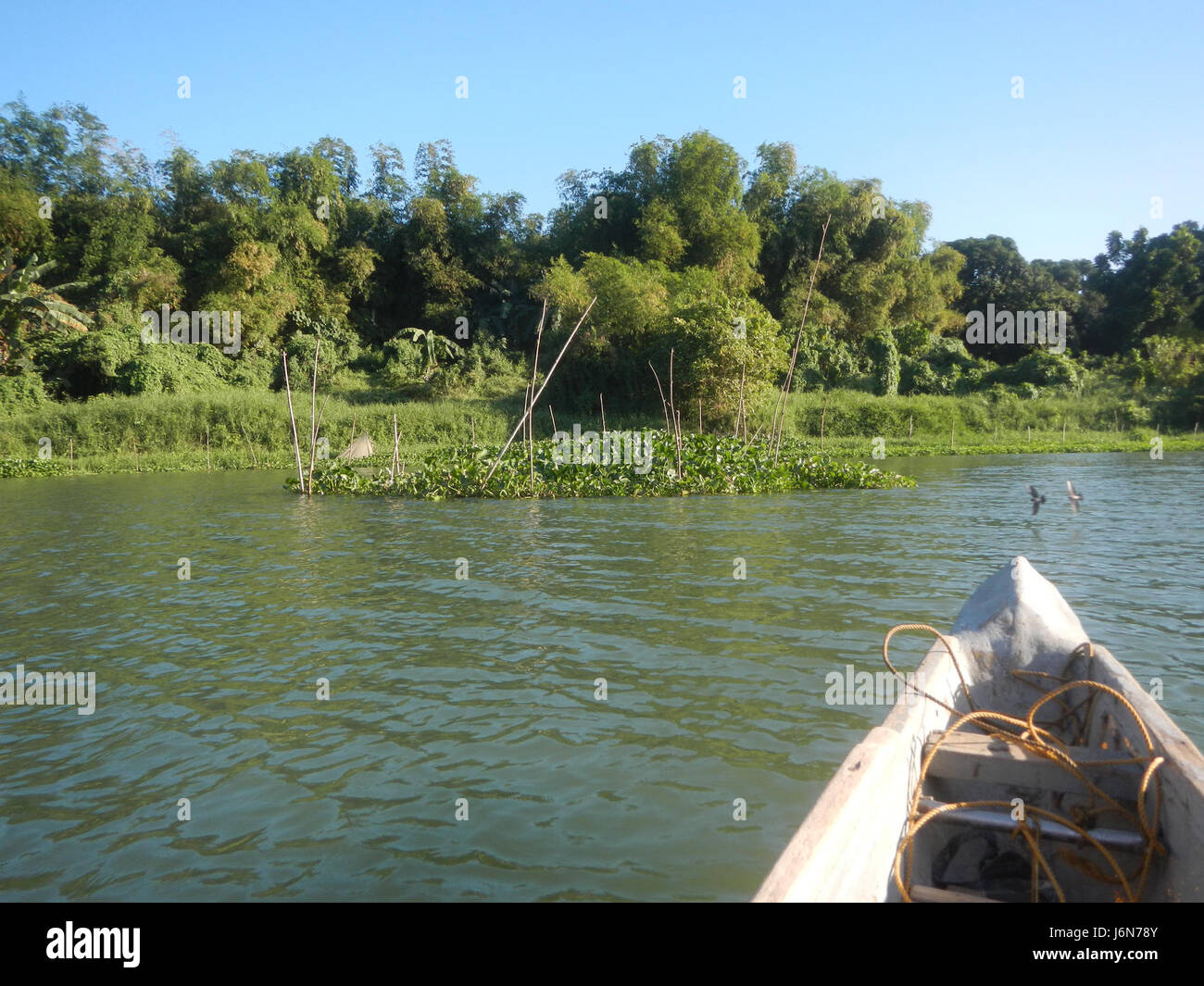 This image depicts the riprap construction along the riverbanks in ...
