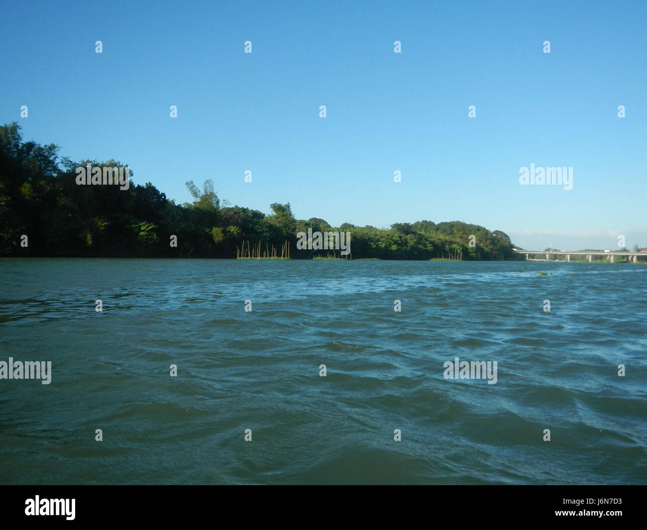 The image features the riverbank riprap construction along the Pulilan ...