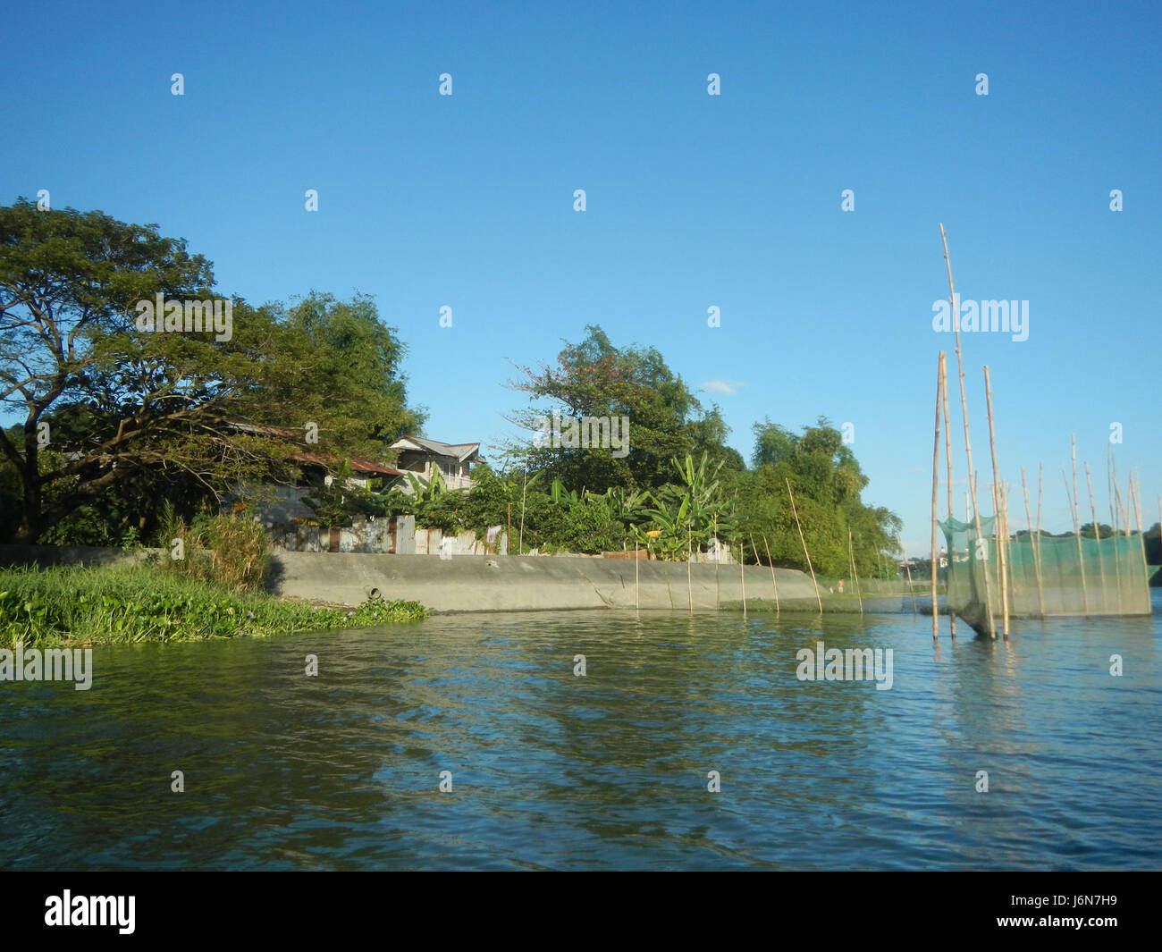 This project in Bulacan focuses on riprap construction along riverbanks ...