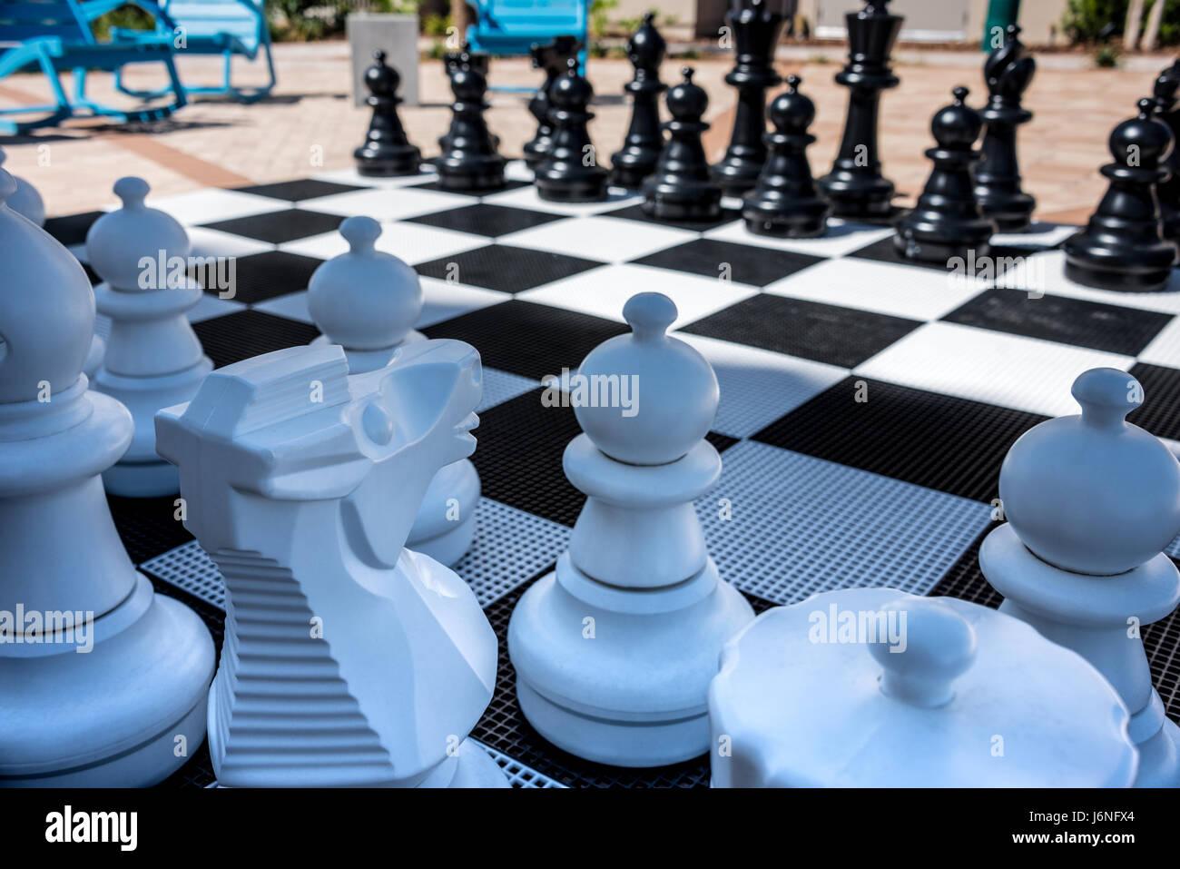 Large outdoor chess board in a courtyard at Harbortown Marina in Jacksonville, Florida, USA. Stock Photo