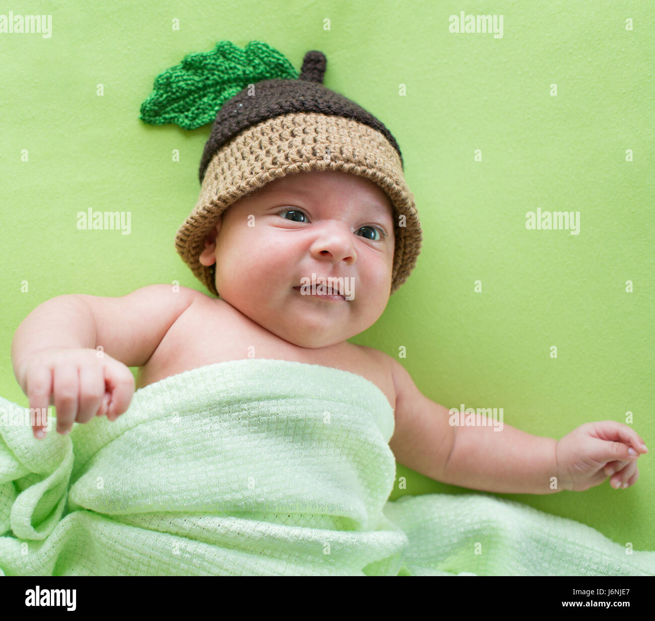 baby boy weared in acorn hat Stock Photo