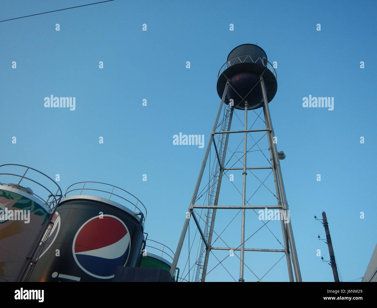 This image shows the Pepsi Cola Products facility located in the Government Center of San Fernando, Pampanga. The facility is part of the global PepsiCo network and plays a key role in the production and distribution of Pepsi Cola beverages in the region. Stock Photo