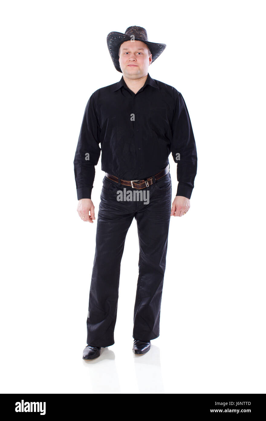 man wearing hat of cowboy standing isolated on white Stock Photo