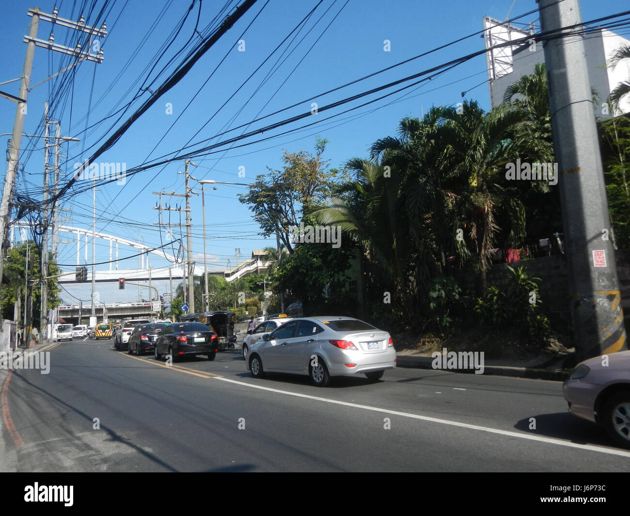 Intersection In Rizal This image shows J.P. Rizal Avenue, a key road in Poblacion, Valenzuela ...