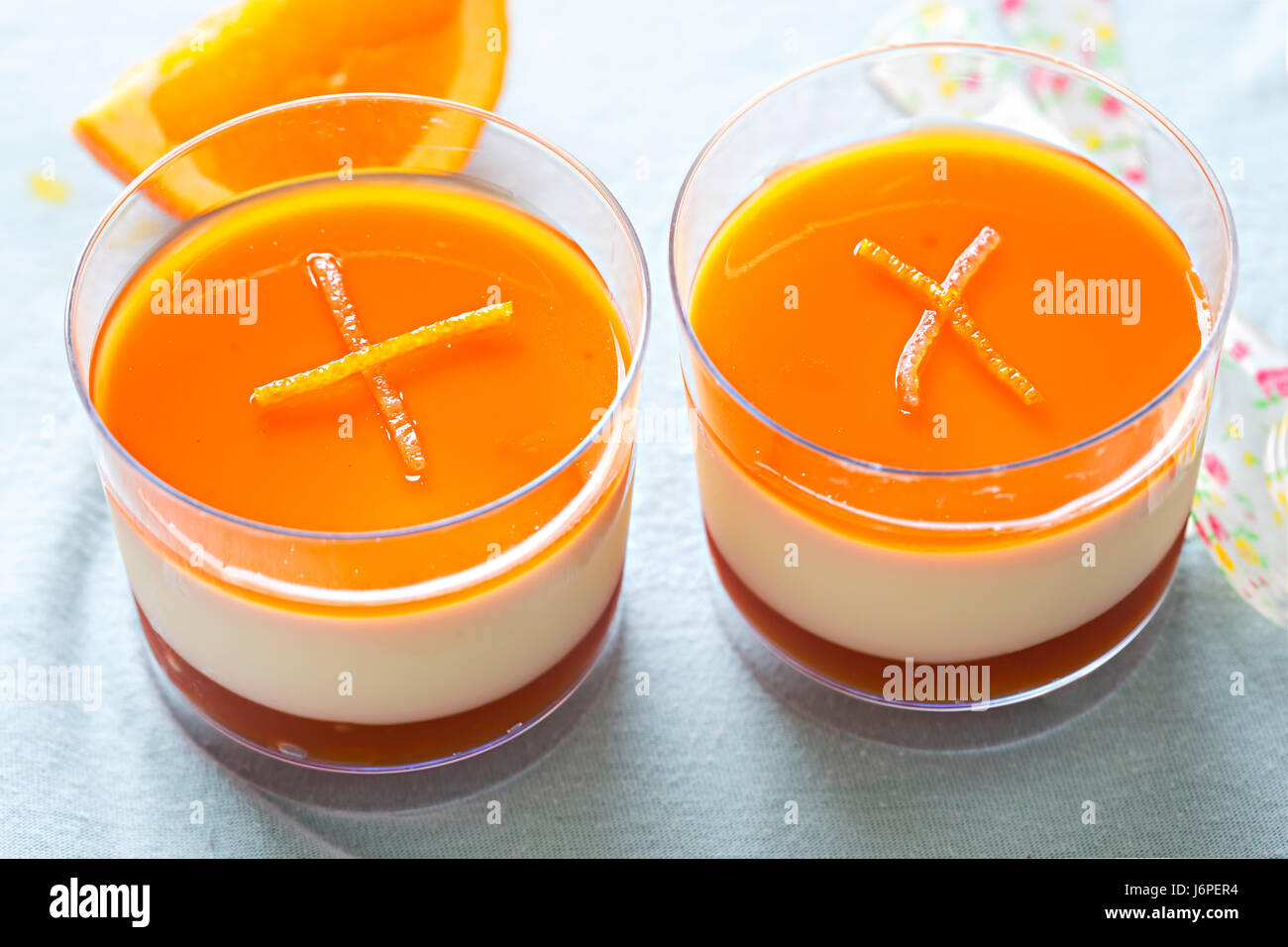 Orange lemon cream sangria jelly dessert pot Stock Photo Alamy