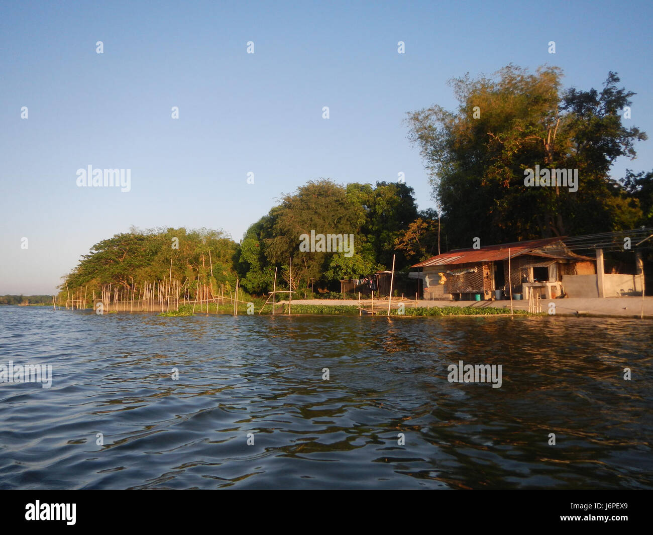 This image depicts the Riverside Districts and bridges in Calumpit ...