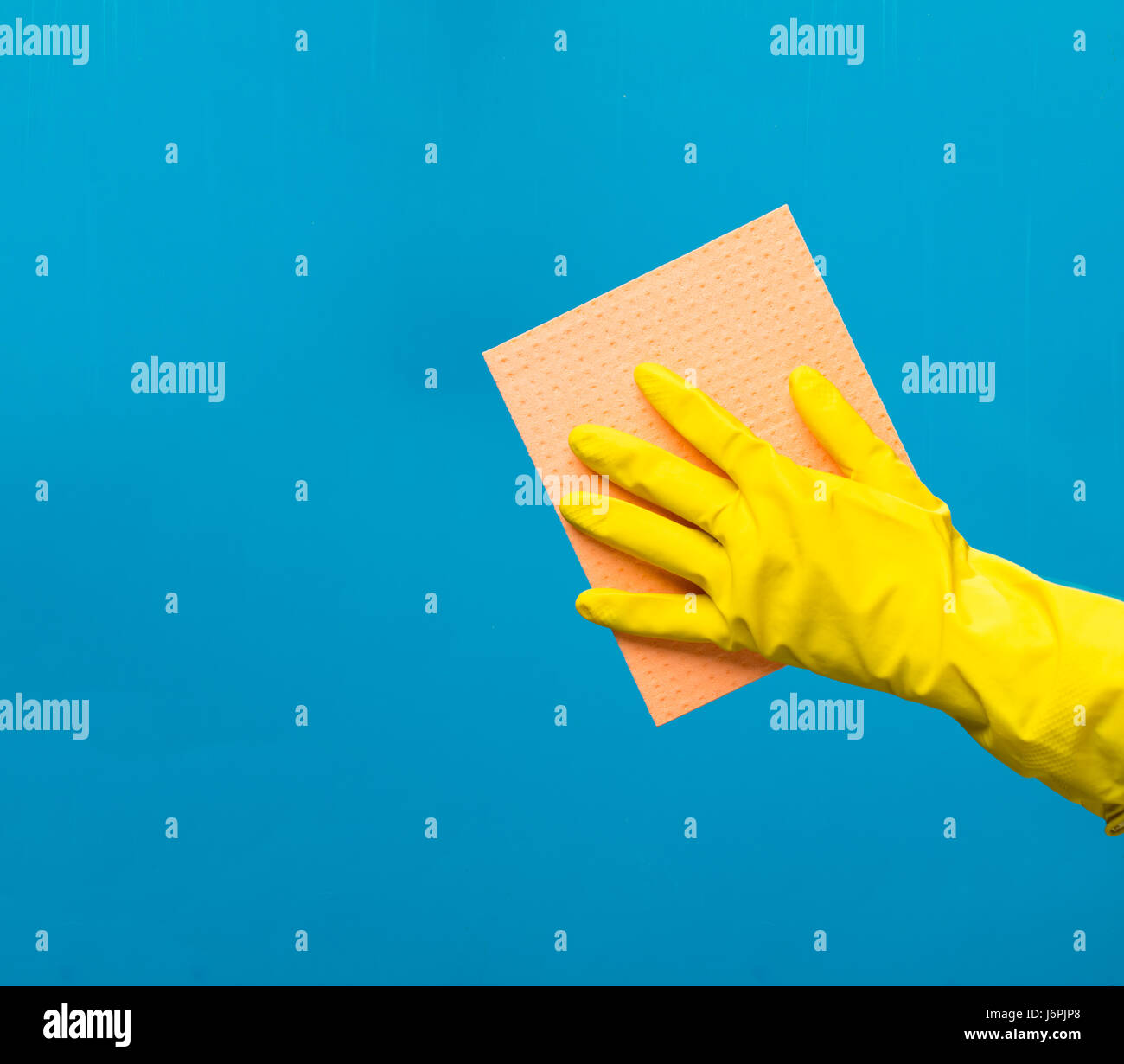 Man wiping window with rag Stock Photo - Alamy