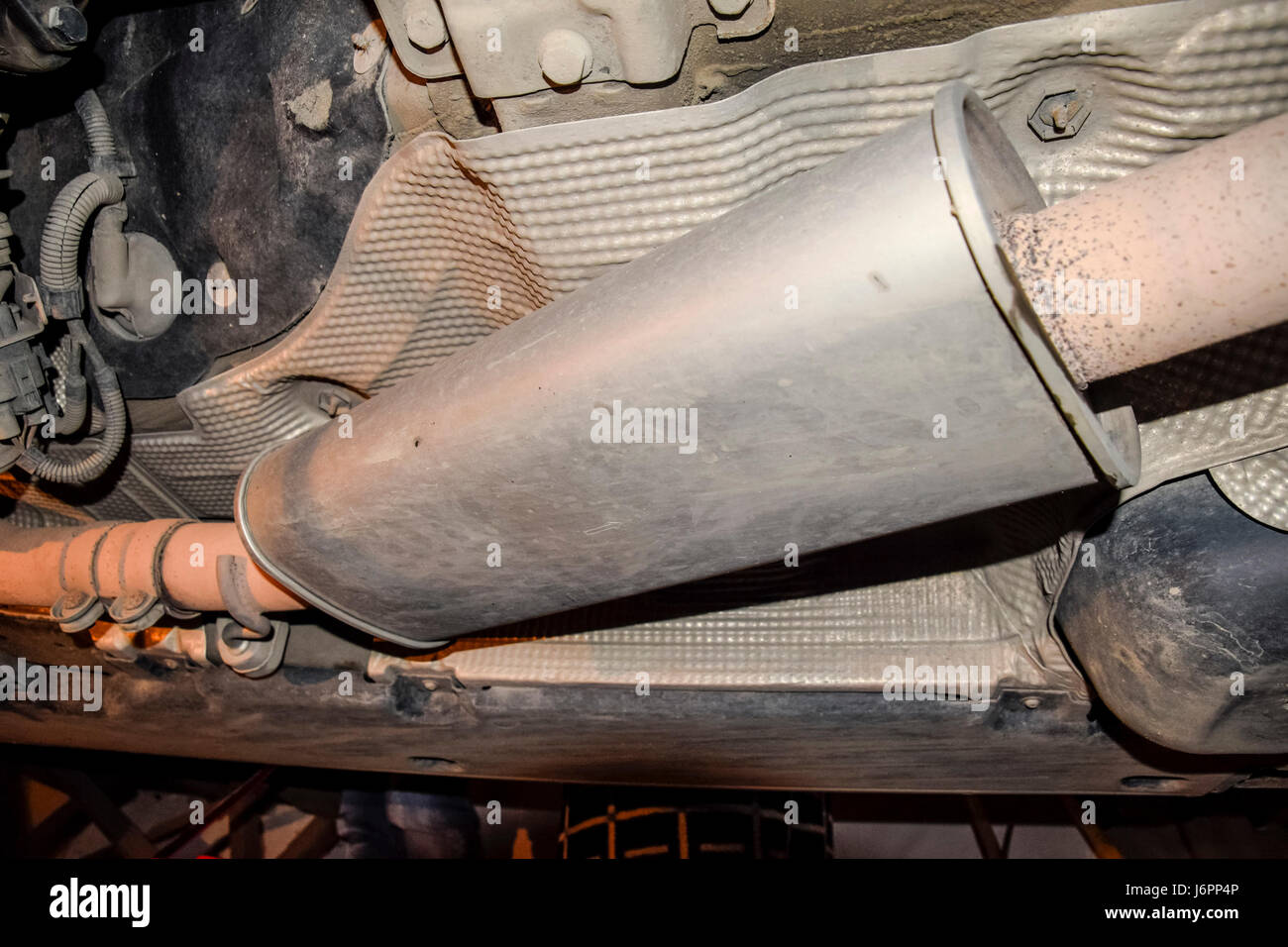 Exhaust system of the car. The muffler of exhaust gases Stock Photo - Alamy