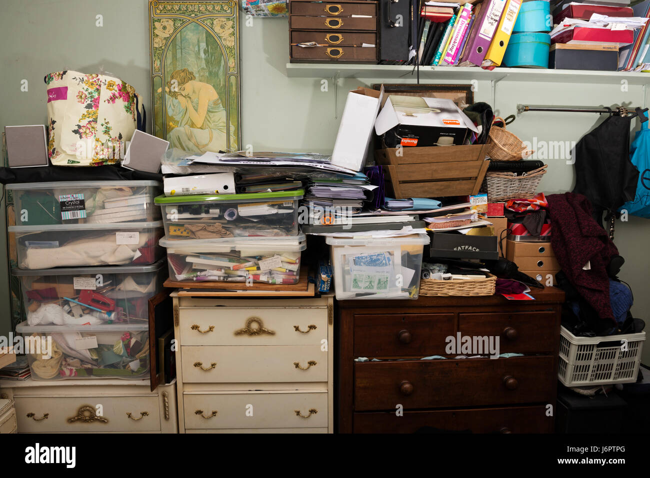 Clutter in small bedroom Stock Photo