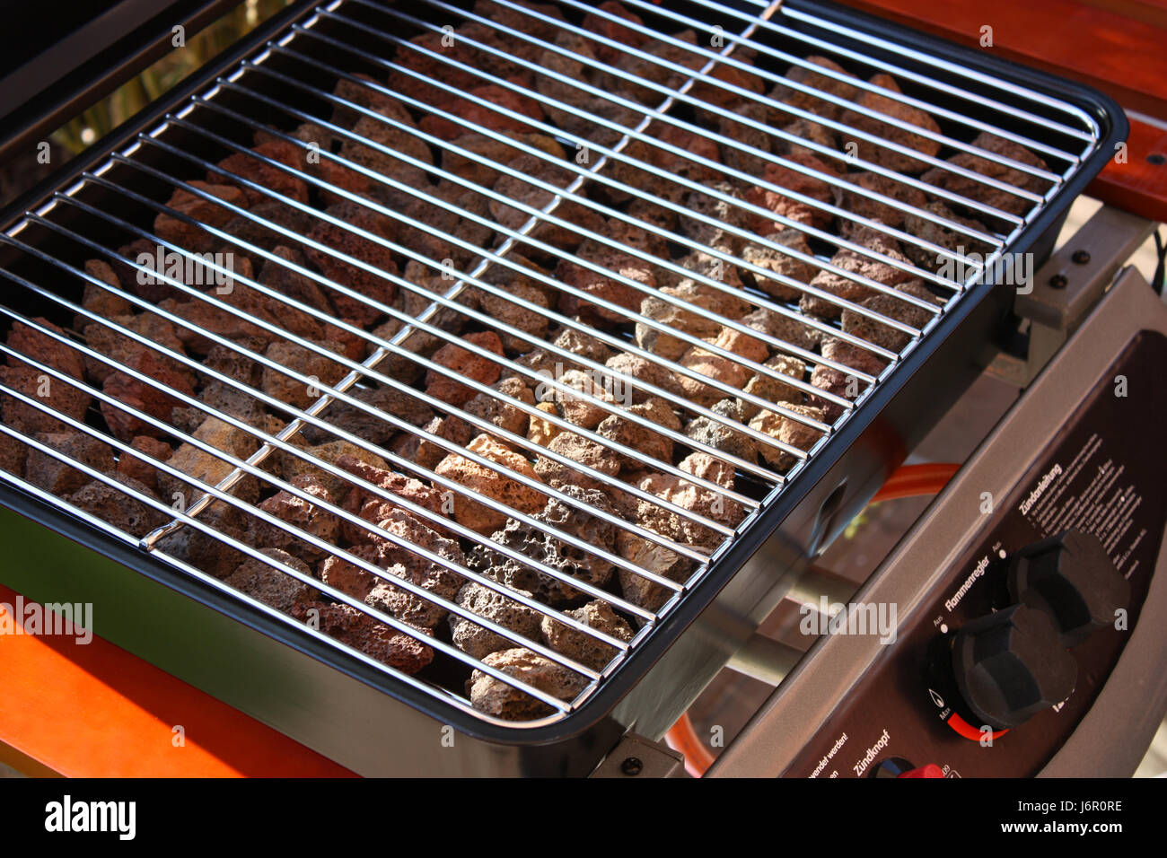 gas grill with lava stones Stock Photo - Alamy