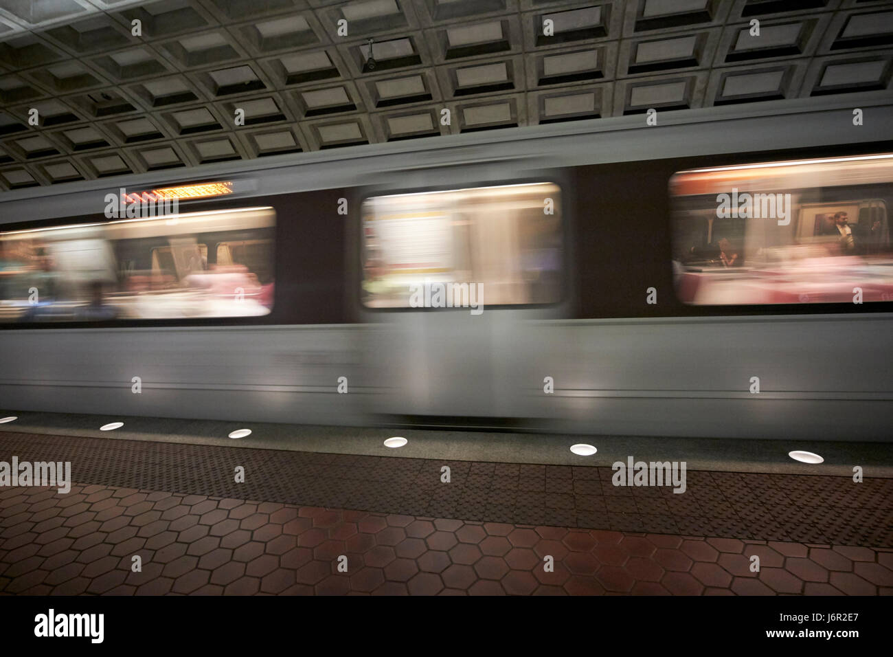 train passing through smithsonian metro underground train system Washington DC USA deliberate motion blur Stock Photo
