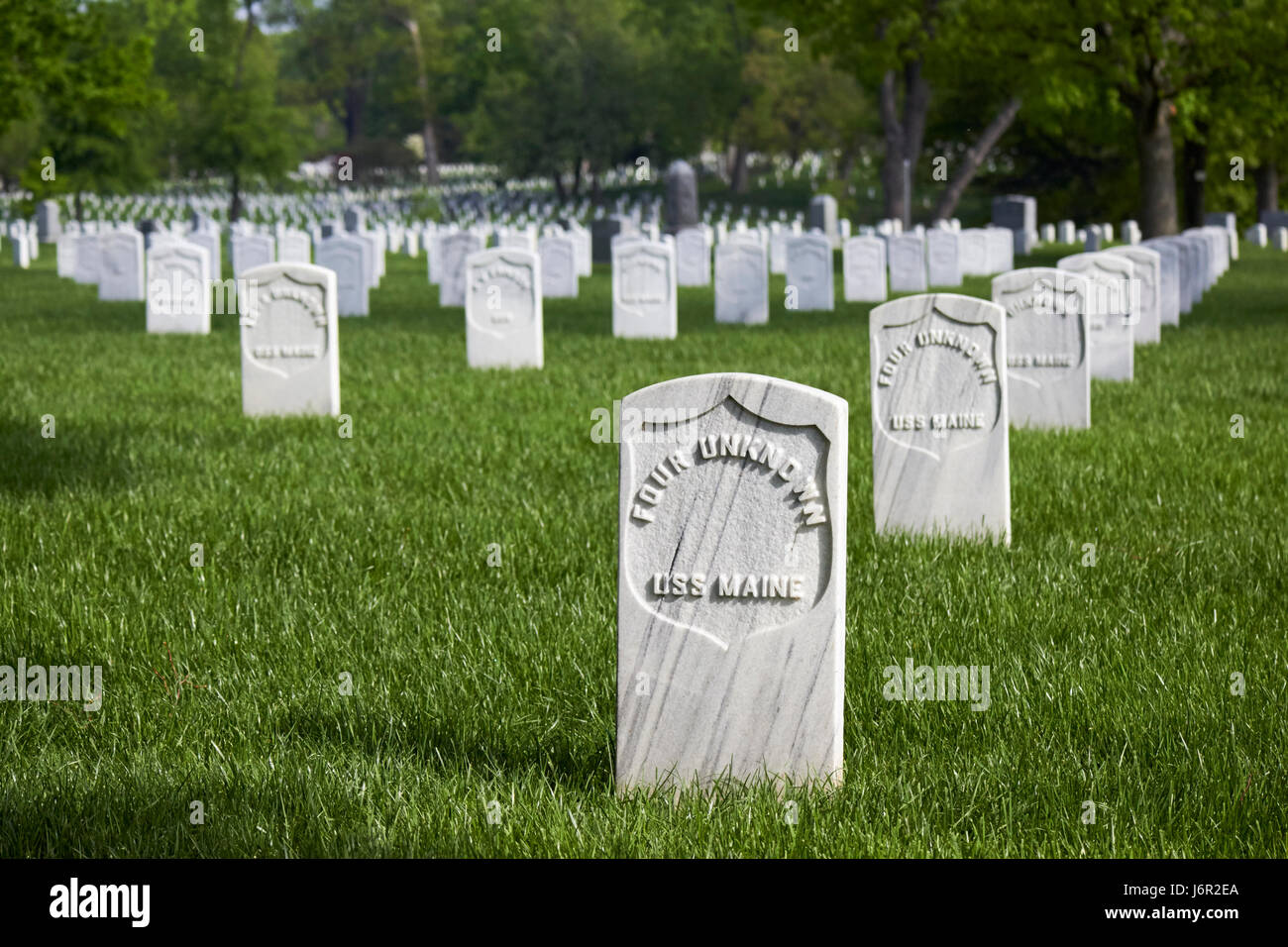 rows of white headstones including unknown sailors from the uss maine at arlington cemetery Washington DC USA Stock Photo