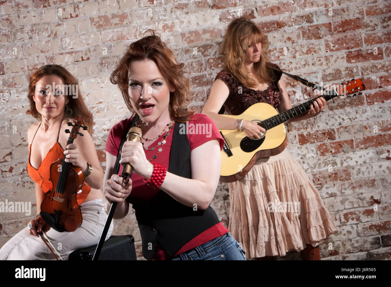 Contemporary folk music trio hires stock photography and images Alamy