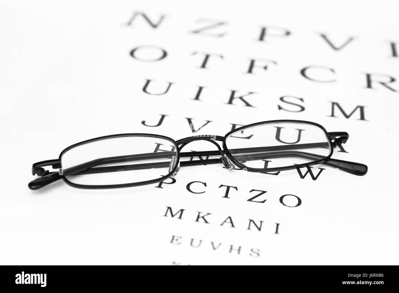 black swarthy jetblack deep black letters spectacles glasses eyeglasses Stock Photo