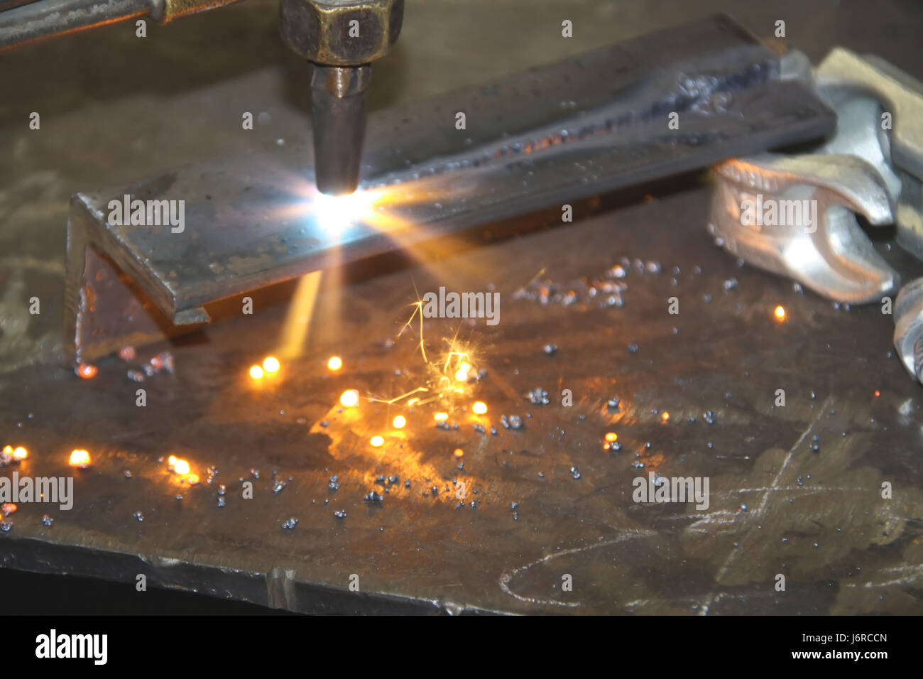 metal fire conflagration work factory cut spark blow torch flashlight