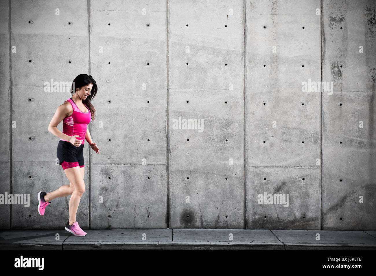Athletic woman runner Stock Photo